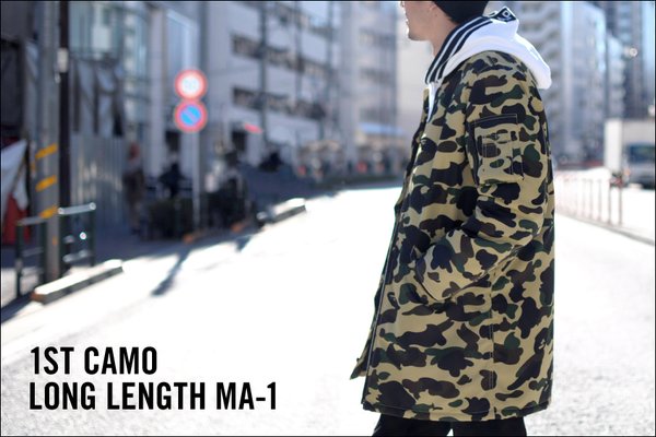 A BATHING APEからオリジナルカモ柄である「1ST CAMO」で仕上げたロング丈のMA-1が2/20発売！(エイプ)