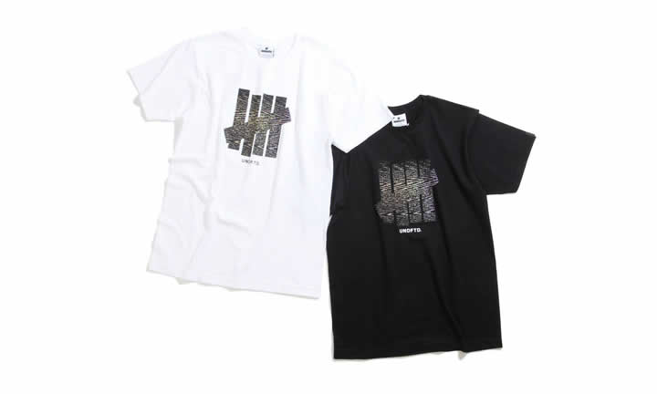 UNDEFEATEDの5本線ロゴ“ファイブ・ストライクス”にデジタルノイズを加えた「STATIC STRIKE TEE」が発売！ (アンディフィーテッド)