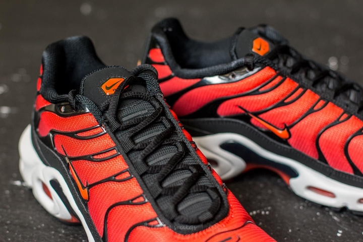 red and orange air max plus