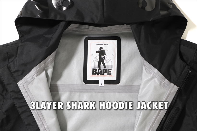 A BATHING APEからテクノロジーとファッションを融合しリアルクローズへと昇華させたHIGH-TECH ARMYとして「3LAYER SHARK HOODIE JACKET」が発売中 (ア ベイシング エイプ)