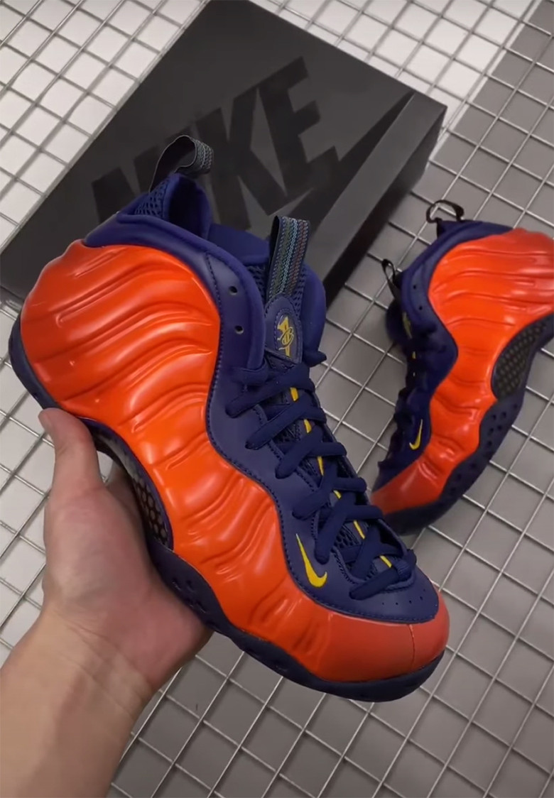 navy blue and orange foamposites