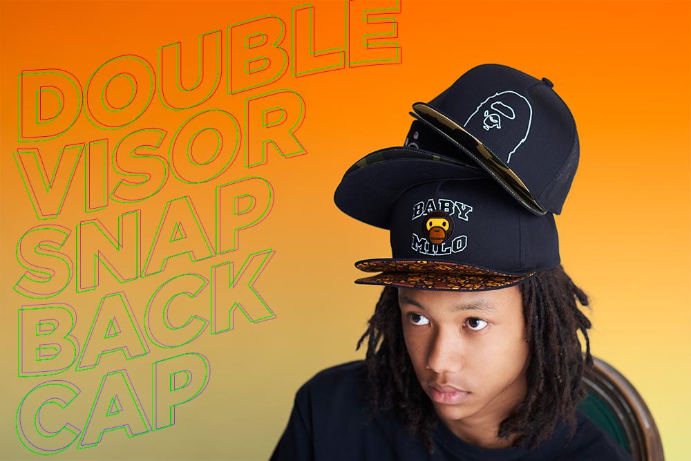 A BATHING APEから1ST CAMOやAPE HEAD、BABY MILO やシャークモチーフを配したスナップバックのダブルバイザーキャップ「DOUBLE VISER SNAP BACK CAP ITEMS」が5/29 発売 (ア ベイシング エイプ)