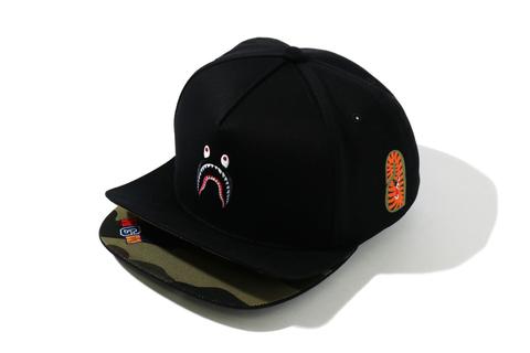 A BATHING APEから1ST CAMOやAPE HEAD、BABY MILO やシャークモチーフを配したスナップバックのダブルバイザーキャップ「DOUBLE VISER SNAP BACK CAP ITEMS」が5/29 発売 (ア ベイシング エイプ)