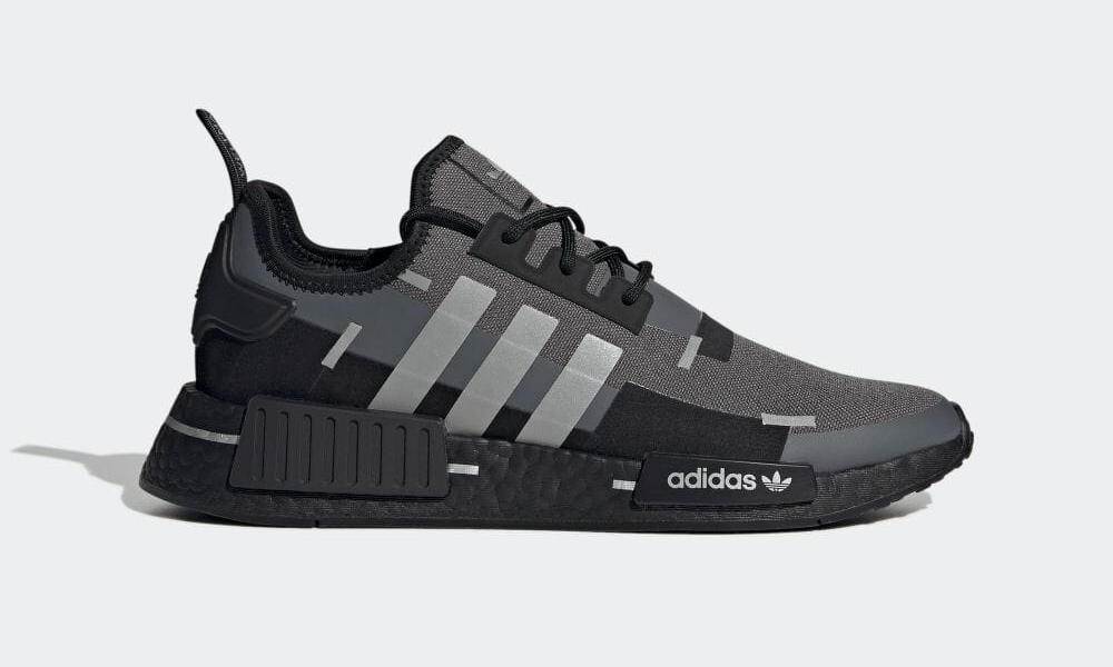 テクニカルジャケットに見られるテーピングを模したadidas Originals NMD_R1 (アディダス オリジナルス エヌエムディ) [GZ7946,GZ7947]