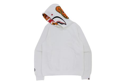 A BATHING APE から人気のタイガーとシャークのモチーフを落とし込んだフーディ「SHARK X TIGER PULLOVER HOODIEN」が9/11 発売 (ア ベイシング エイプ)