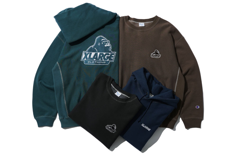 11/6 発売！XLARGE × Champion コラボレーション最新作のREVERSE WEAVE クルーネック/フーディ ​(エクストララージ チャンピオン)