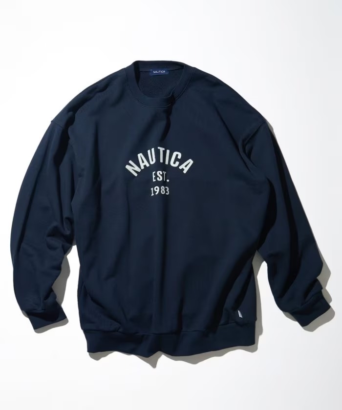 「NAUTICA/ノーティカ」から象徴的なフェルトアーチロゴを配置した”Felt Patch Arch Logo Crewneck Sweatshirt”が発売！