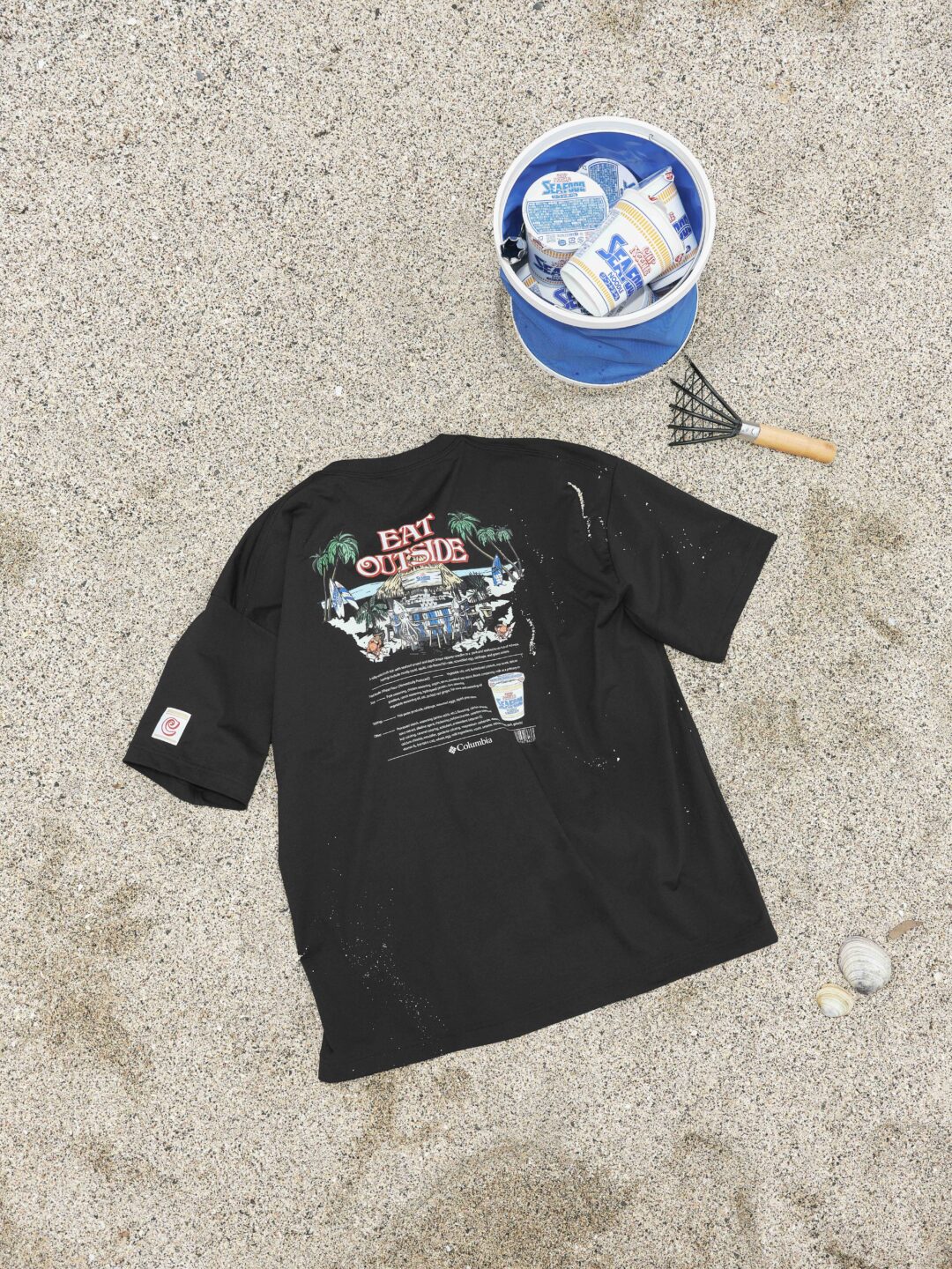 コロンビア × カップヌードル 55周年記念コラボ第2弾「シーフードヌードル ショートスリーブTシャツ」が2026年 7/17 発売 (Columbia)